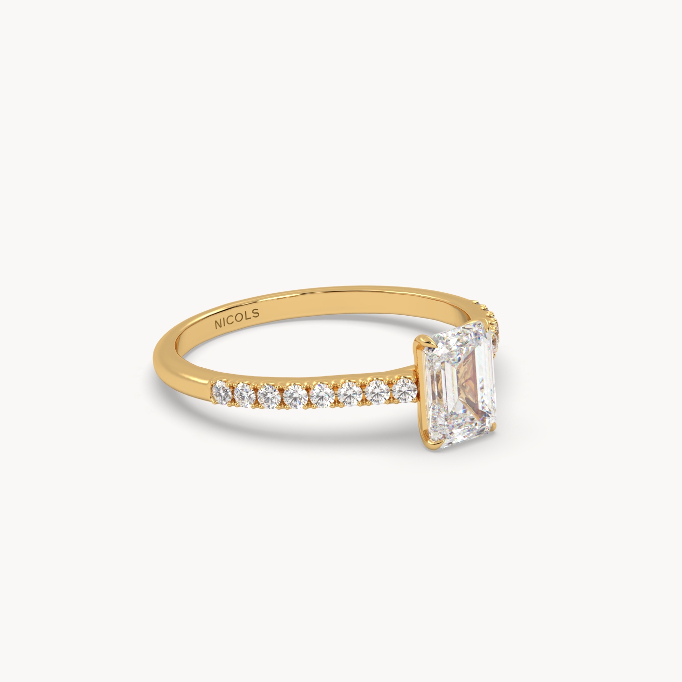 18k yellow gold  petite pavé cathedral engagement ring for 0.70ct emerald cut diamond